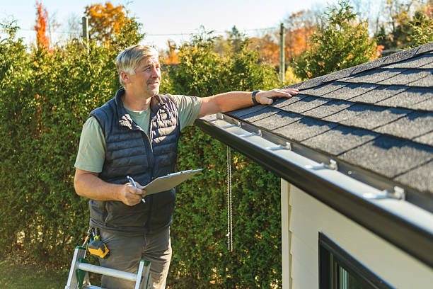 Professional Hail Damage Roof Repair technician working in Enumclaw, WA
